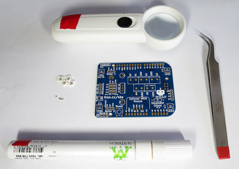 File:SimpleBot SMD Componenents plus tools.jpg