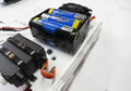 SimpleBot battery pack on base from side.jpg